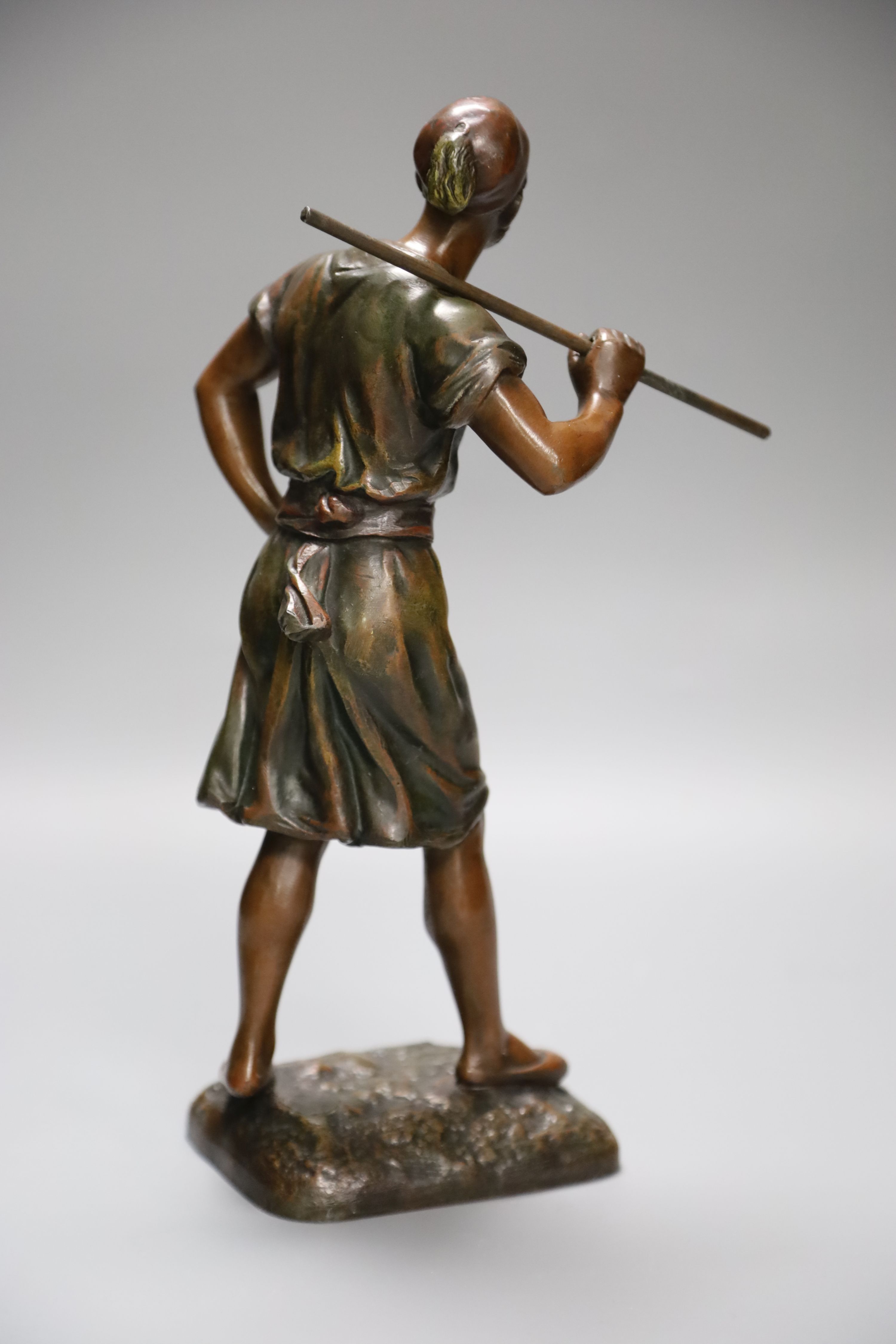 A spelter figure of a watercarrier, signed Debut, height 31cm